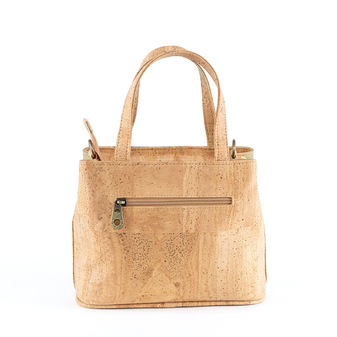 Handbag in cork, with two handles, shoulder strap and several interior compartments