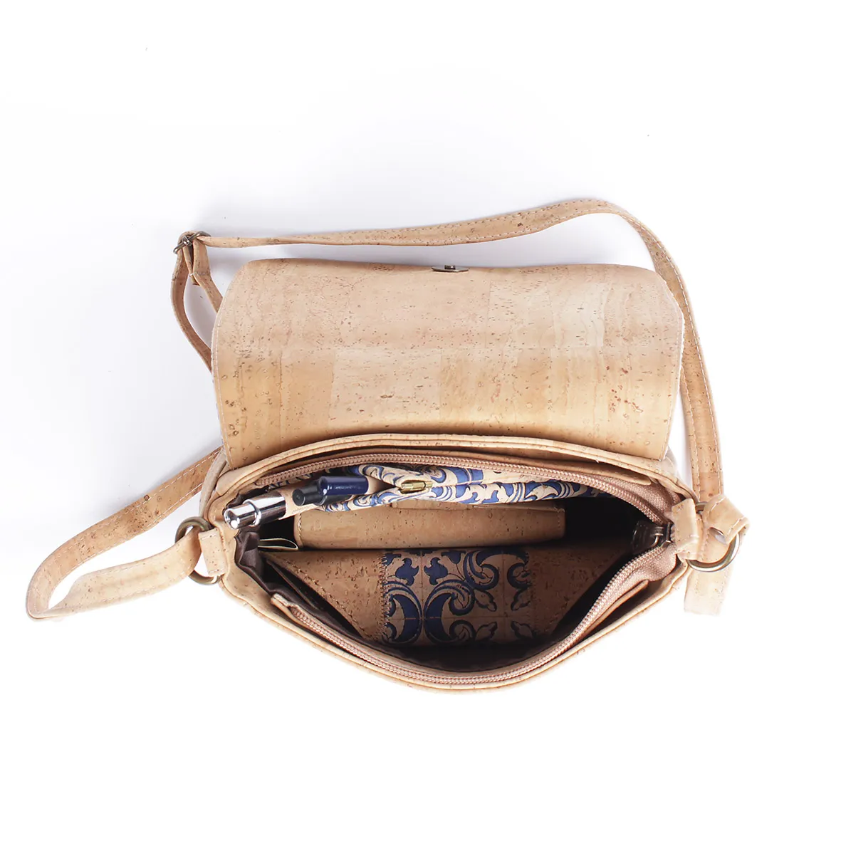 Shoulder bag with cork handle and gold leaf pattern