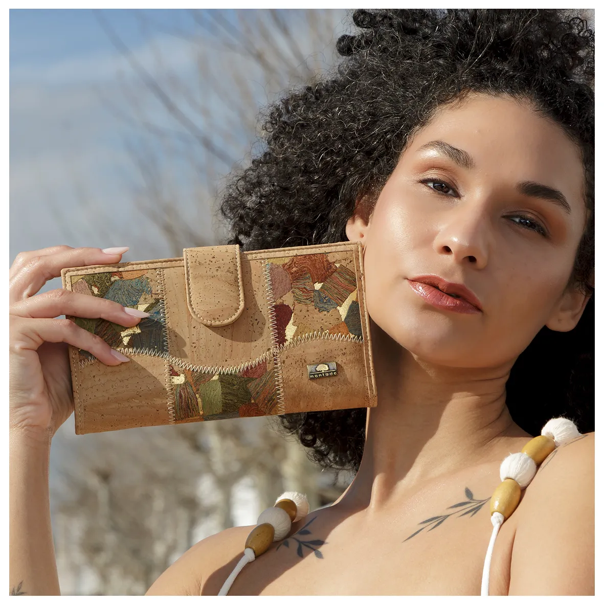 Large, structured cork coin purse with anti-theft protection and patchwork exterior